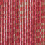 Detail of a hand-woven cotton fabric in an intricate stripe pattern in shades of pink, red and white.