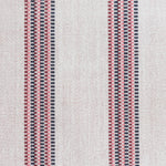 Detail of a hand-woven cotton fabric in an irregular stripe pattern in navy, red and pink on a white field.
