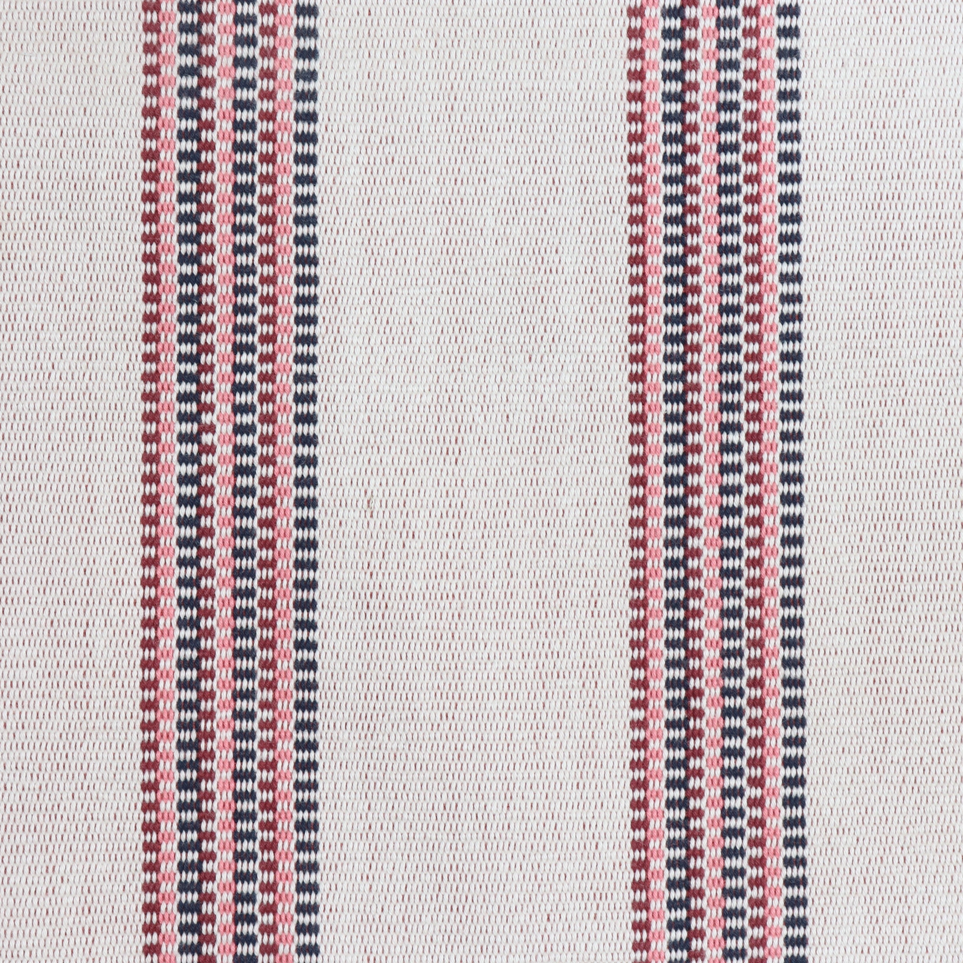 Detail of a hand-woven cotton fabric in an irregular stripe pattern in navy, red and pink on a white field.