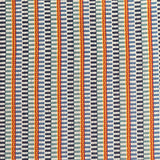 Detail of a hand-woven cotton fabric in an intricate gridded stripe pattern in shades of blue, white, red and yellow.