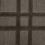 Broadloom carpet in a dimensional plaid pattern in brown.