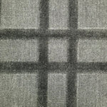 Broadloom carpet in a dimensional plaid pattern in grey.