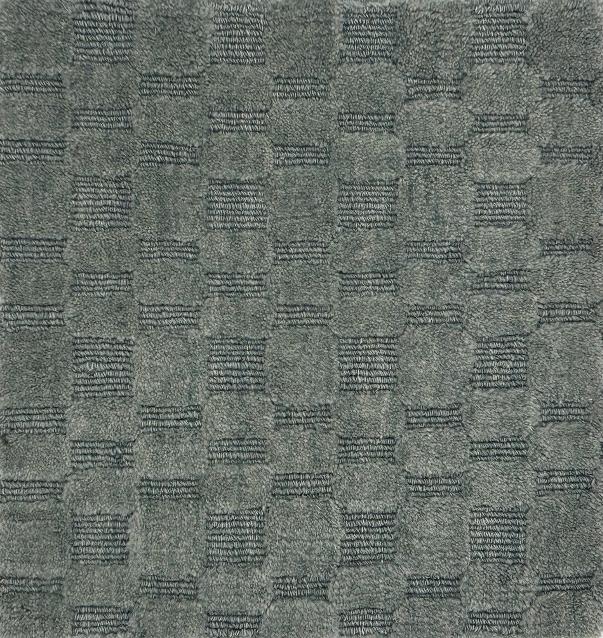 Textured slate blue carpet with a checkered pattern