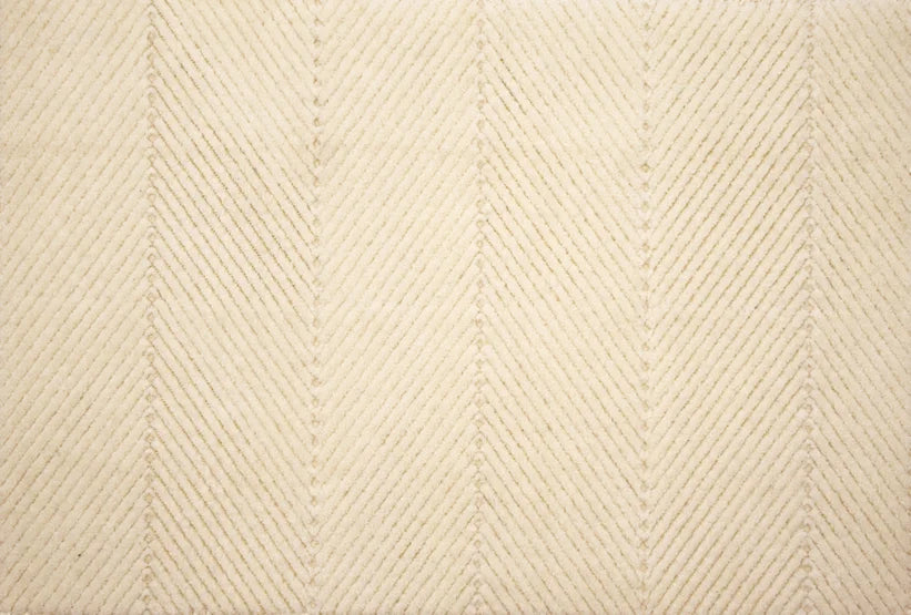 Broadloom carpet swatch in a textured pattern in a cream design