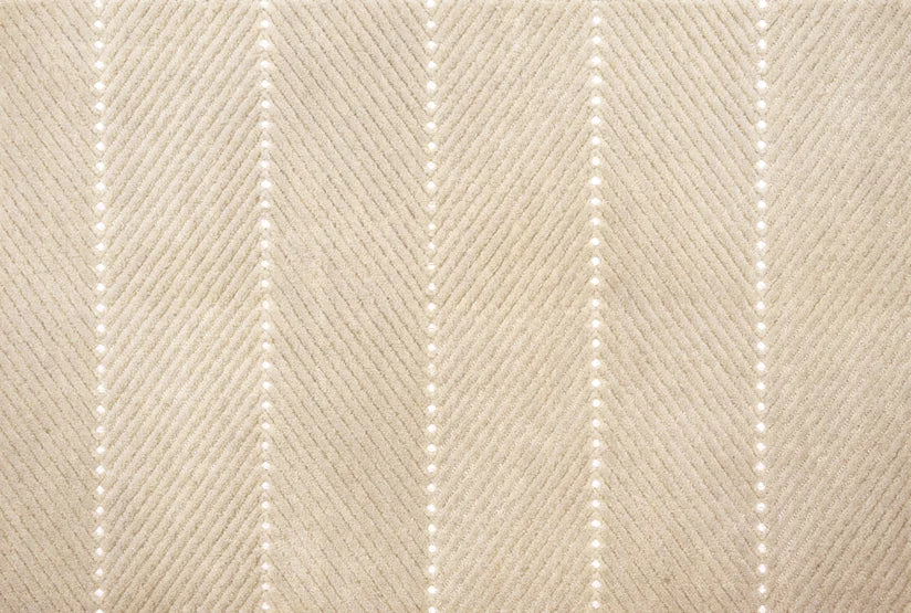 Broadloom carpet swatch in a textured pattern in a neutral white design