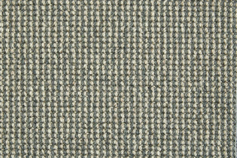 Broadloom carpet swatch in textural pattern green color