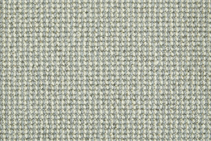 Broadloom carpet swatch in textural pattern light blue color