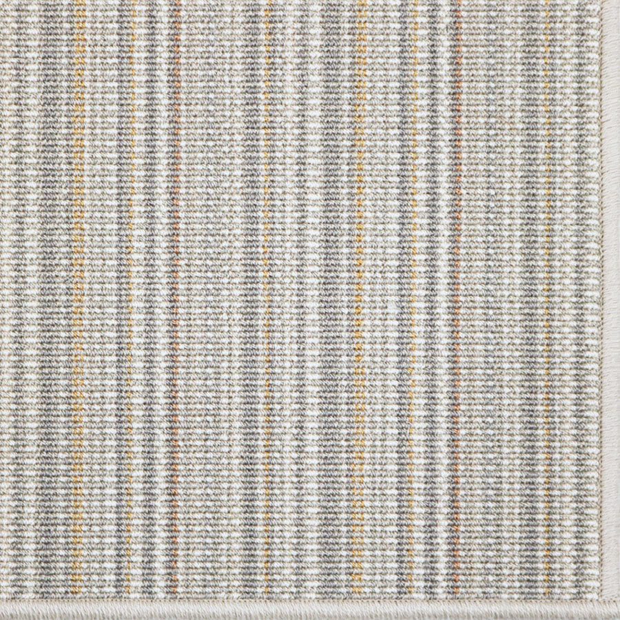 Broadloom carpet with vertical stripes in gray and beige tones