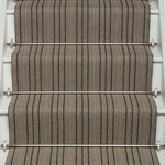 Striped flatweave runner in black and ivory on white staircase