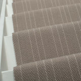 Striped flatweave runner in light grey on white staircase