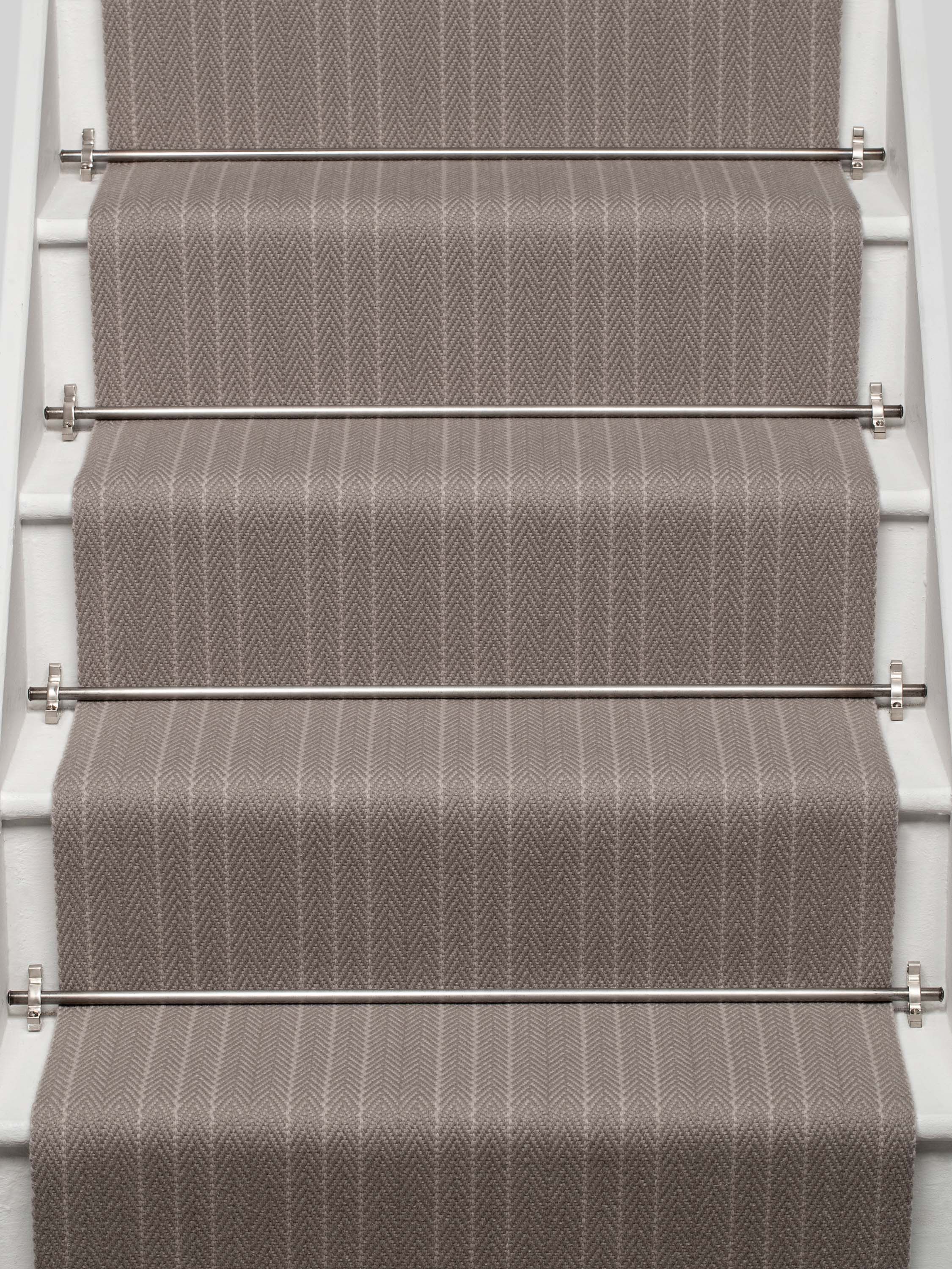 Striped flatweave runner in light grey on white staircase