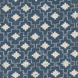 Detail of fabric in a geometric grid print in white on a navy field.