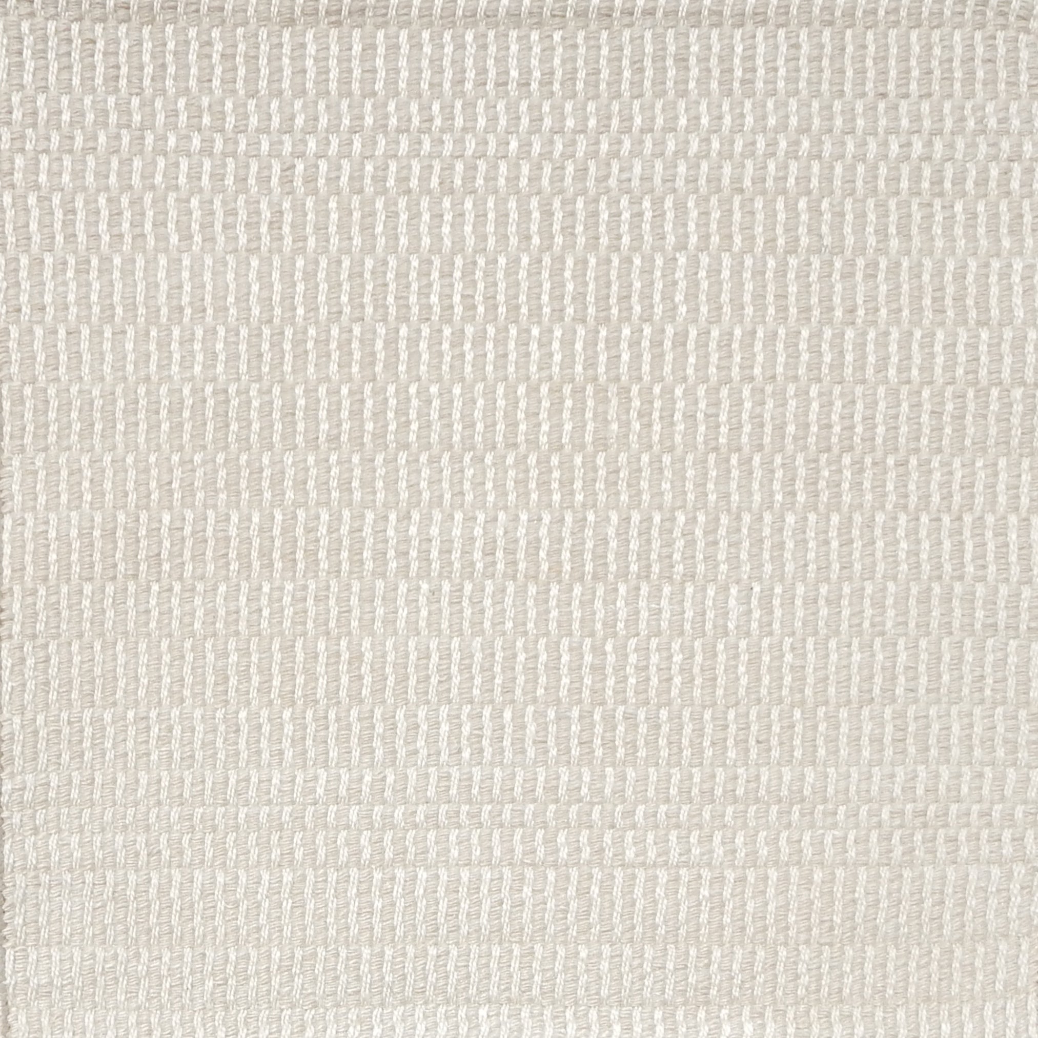 Textural woven carpet in cream