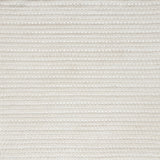 Close-up of a cream textured woven rug