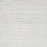 Close-up of white textured woven rug