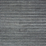 Textured black and white woven rug.