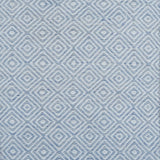 Blue and white diamond pattern flatweave rug. 