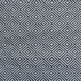 Patterned rug with black and white geometric design