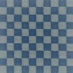 Checkered pattern carpet with alternating blue and gray squares