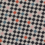 Detail of jacquard fabric in a checked pattern in shades of pink, red, blue and black on a tan field.