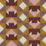 Detail of wallpaper in a geometric grid print in shades of purple and mustard on a cream field.