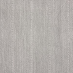 Close up of a broadloom carpet with a herringbone stripe in grey.