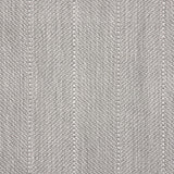 Close up of a broadloom carpet with a herringbone stripe in grey.