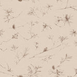Detail of fabric in a painterly pine cone and branch print in brown on a cream field.