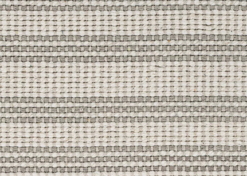 Broadloom carpet in cream and grey stripes.