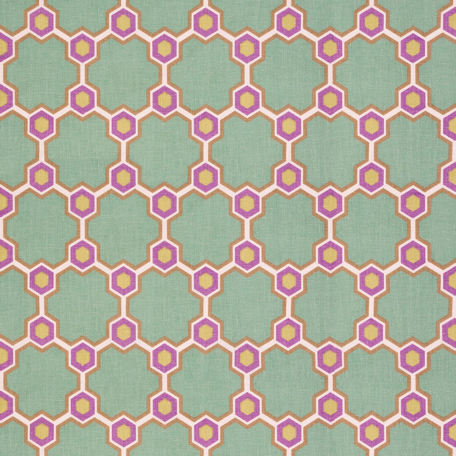 Detail of fabric in a geometric honeycomb pattern in shades of green, purple, white and orange.