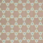 Detail of fabric in a geometric honeycomb pattern in shades of green, blue, cream and brown.