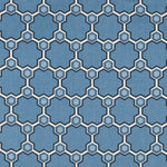 Detail of fabric in a geometric honeycomb pattern in shades of blue, cream and charcoal.