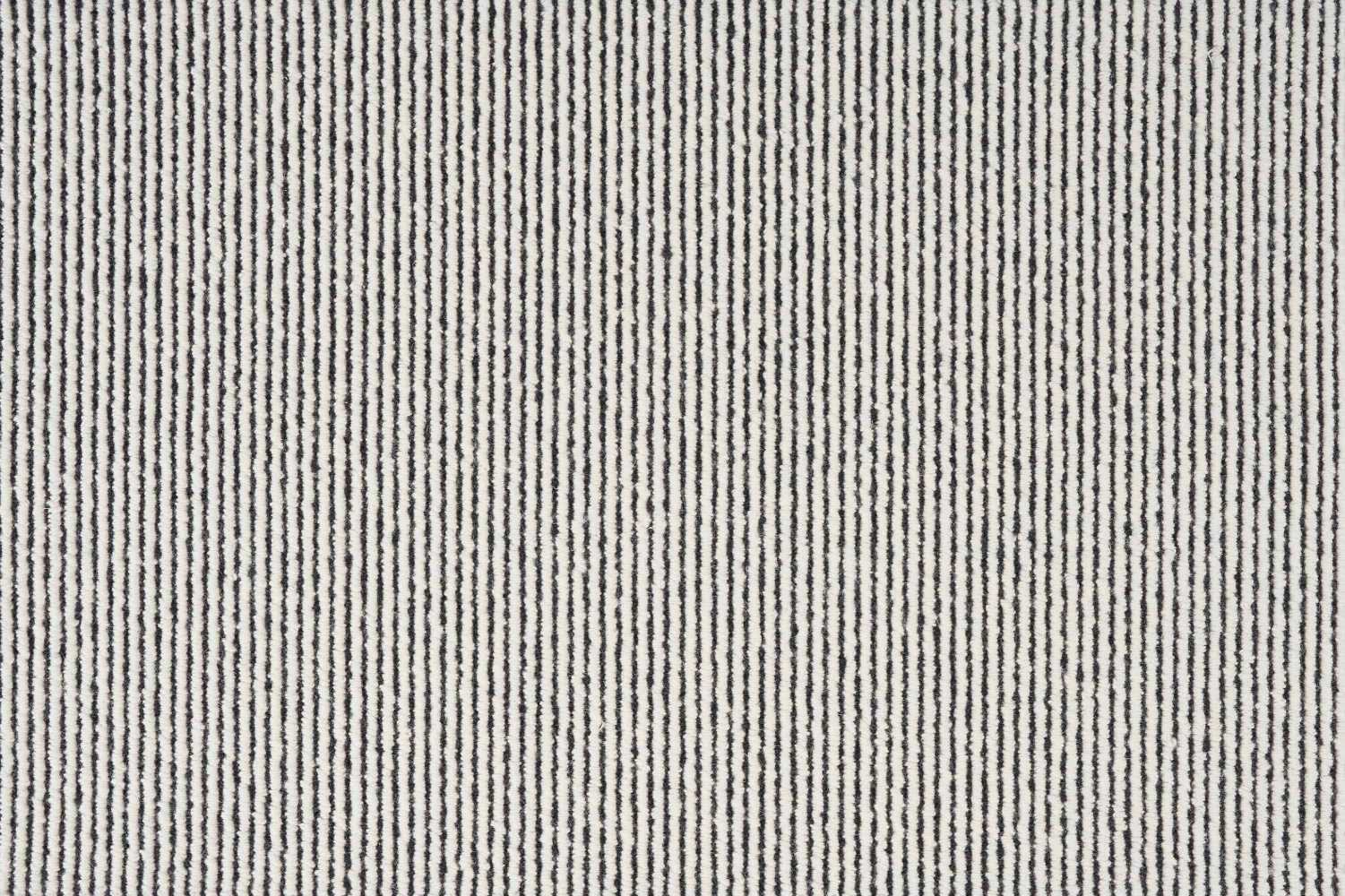 Broadloom carpet with pinstripes in cream and dark blue.