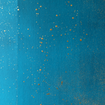 Detail of a wallpaper in a random splattered pattern in metallic gold on a blue field.