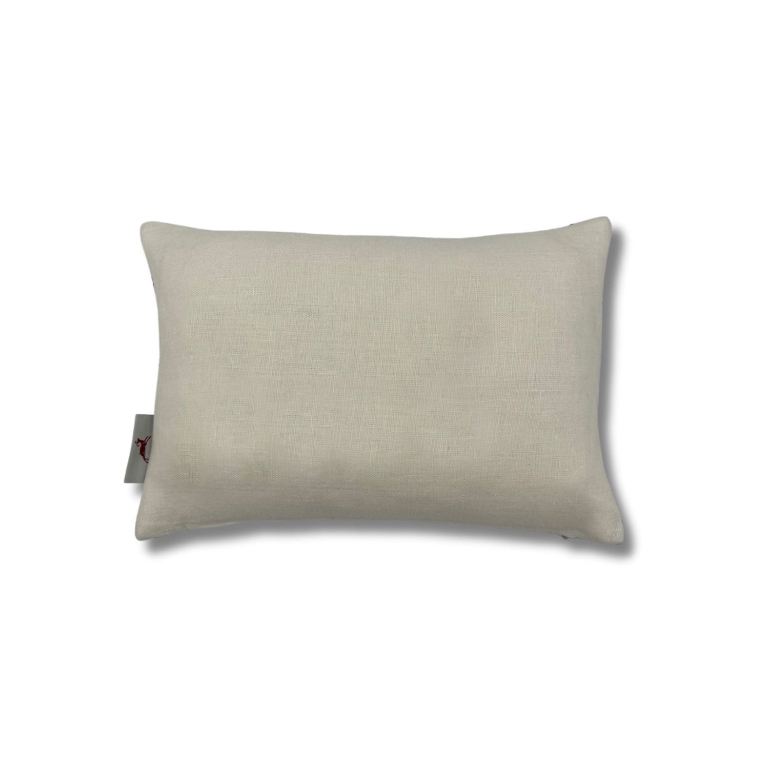 Rectangular throw pillow in solid cream linen. 