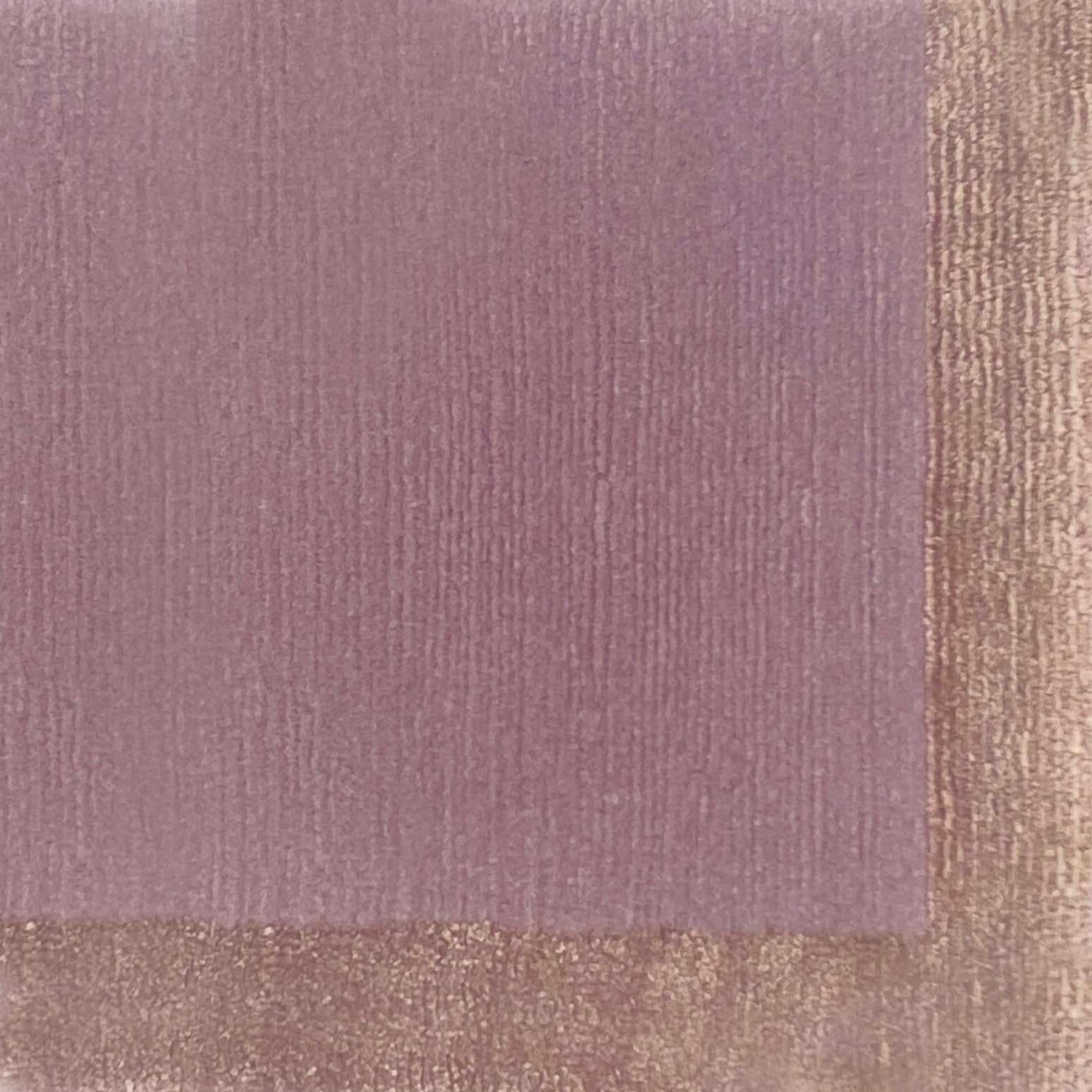 Handknotted carpet with contrast border in pastel purple. 