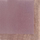 Handknotted carpet with contrast border in pastel purple. 