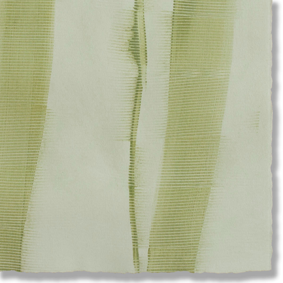 Detail of a handmade wallpaper swatch with an irregular combed stripe pattern in green on a light sage field.