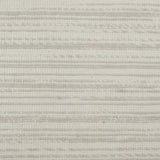 Broadloom carpet in a striped pattern in a light grey cream design