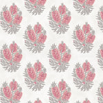 Detail of wallpaper in a floral cameo print in dusty rose and gray on a white field.