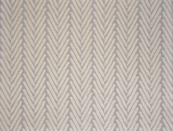 Broadloom carpet swatch in herringbone pattern light grey color