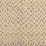 Broadloom carpet in a zig zag diamond pattern in cream and natural fibre. 