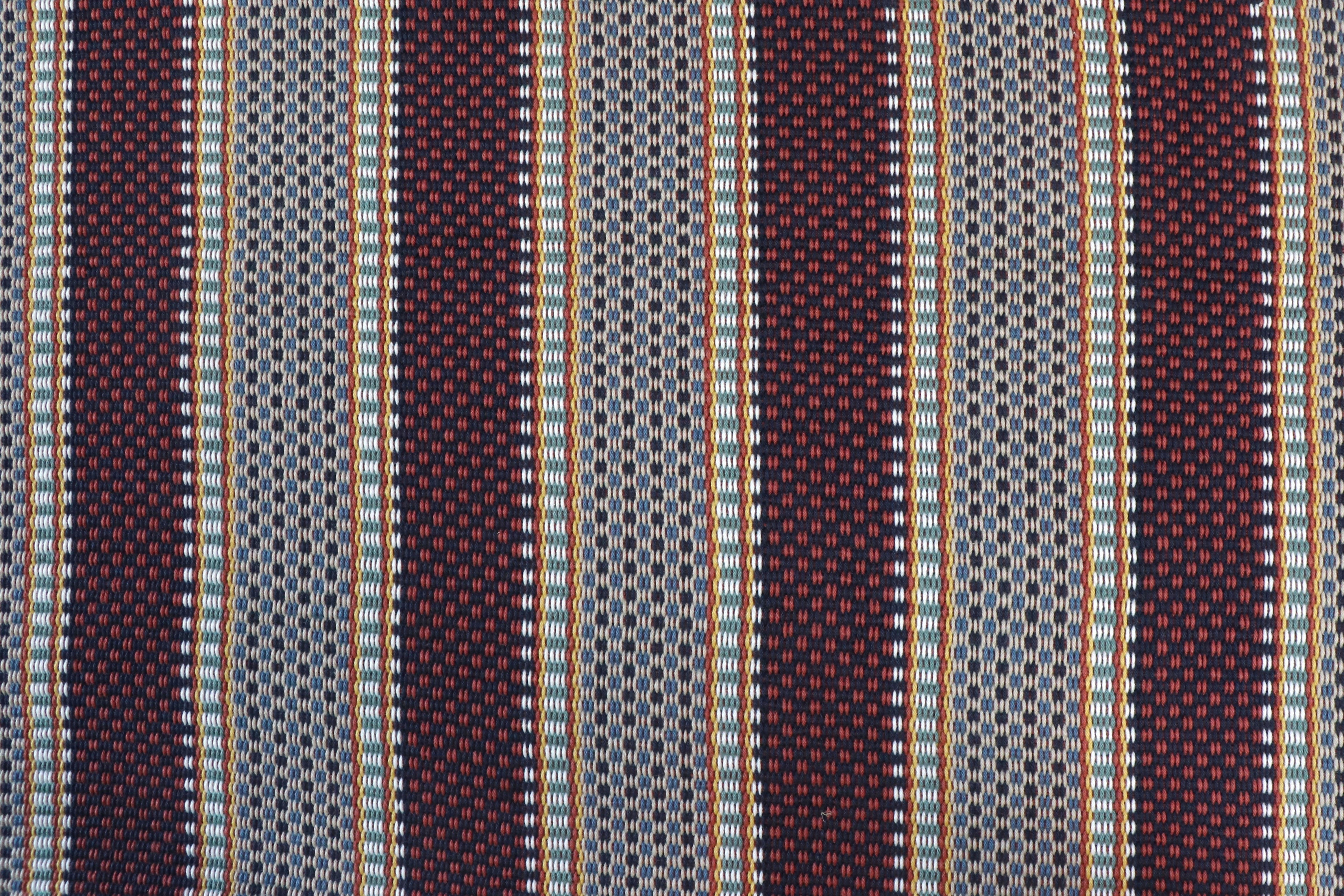 Striped fabric pattern with red, blue, yellow and green colors