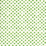 Detail of fabric in a painterly dot print in green and blue on a light yellow field.