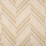 Broadloom carpet with a graphic herringbone pattern in shades of tan and white. 