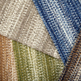 Broadloom carpet swatches in textural braid pattern in various colors. 