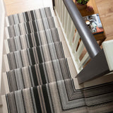 Striped flatweave runner in black white and grey on white staircase