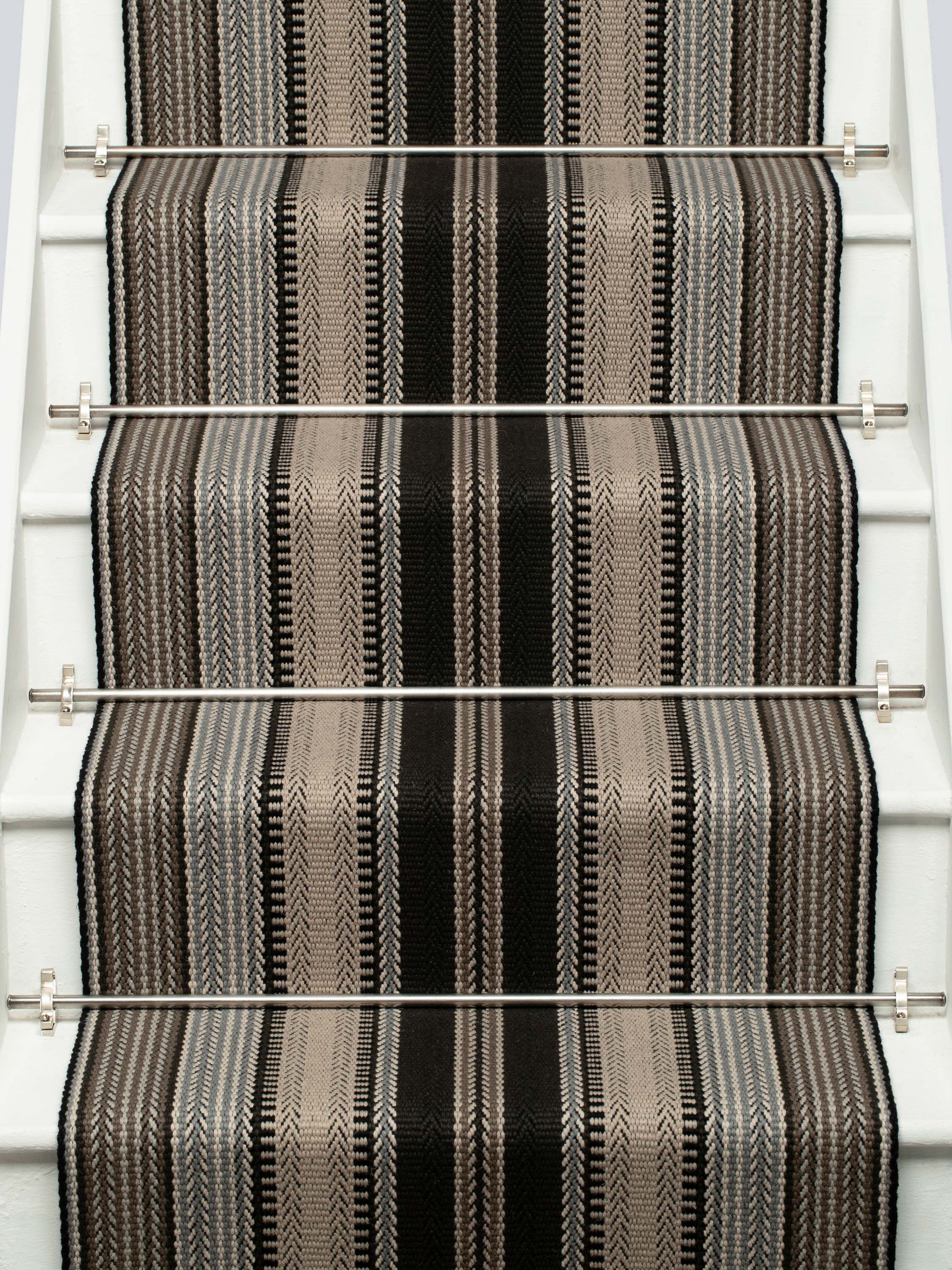 Striped flatweave runner in black white and grey on white staircase