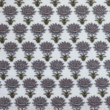 Pattern of purple flowers with green stems on a white background