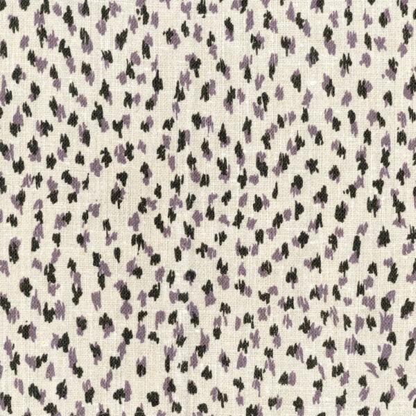 Fabric in a cheetah print in black and purple on a cream field.